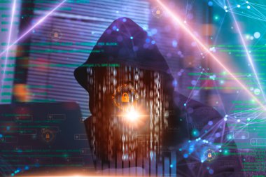 Hacker in hoodie attack laptop computer,dangerous data server and Infects system, binary code digital,hacking and malware preventing website attack concept, digital data thief cyber security concept