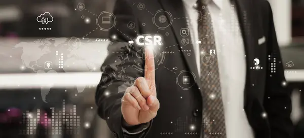 Stock image Businessman finger touching icon CSR, concept business and organization, global network technology with  Social Responsibility and Sustainable Initiatives and giving back to community 