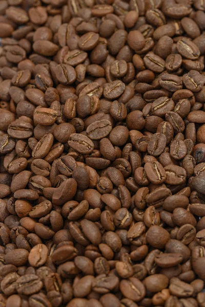 焙煎したコーヒー豆の質感 碑文や広告のための場所 コーヒーを背景にしたフリースペース — ストック写真