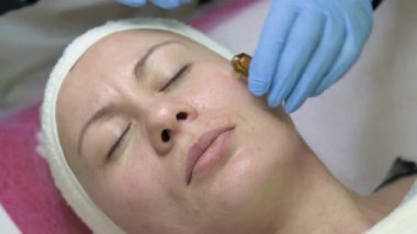Ampoule with vitamin C for application directly to the face for the procedure of mesotherapy with the help of dermapen, application of liquid to the face.