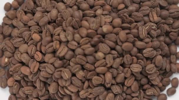 烤咖啡豆 关闭的视频咖啡豆 顶部的咖啡 Hd视频和一堆咖啡豆 — 图库视频影像