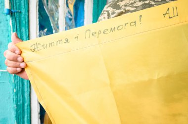 Kyiv, Ukraine July 1, 200: Ukrainian flag and military inscription on it, Russian Ukrainian war.