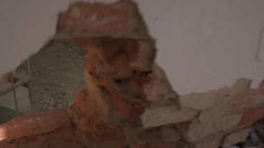 Hole in the brick wall, broken and destroyed industrial and industrial building, video 4k.