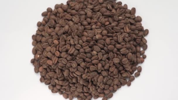 焙煎されたコーヒー豆 コーヒー豆のビデオ コーヒーのトップビュー Hdビデオ コーヒー豆の束 — ストック動画