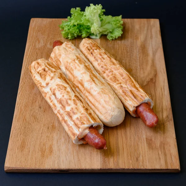 Three French Hot Dogs Wooden Board Black Background Fast Food — Stock Photo, Image