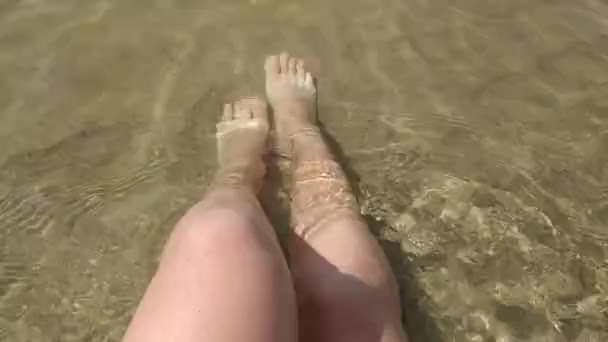 Bare Female Legs Seashore Washed Small Waves Clear Clean Sea — Stock Video