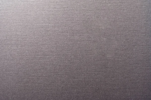 Background with a fine grain uniform texture of anthracite color
