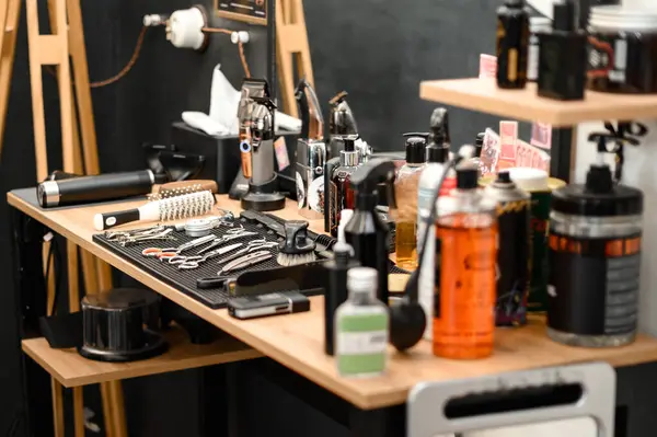 Barbers tools for mens haircuts laid out on a table close up