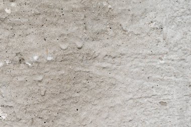 Gri çimento kum havanıyla dekore edilmiş eski bir duvarın arka planı