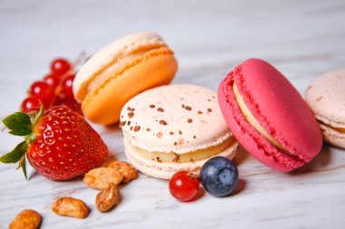 Macaron pink, orange and beige, blue on marble style. A beautifu