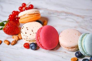 Macaron pink, orange and beige, blue on marble style. A beautifu