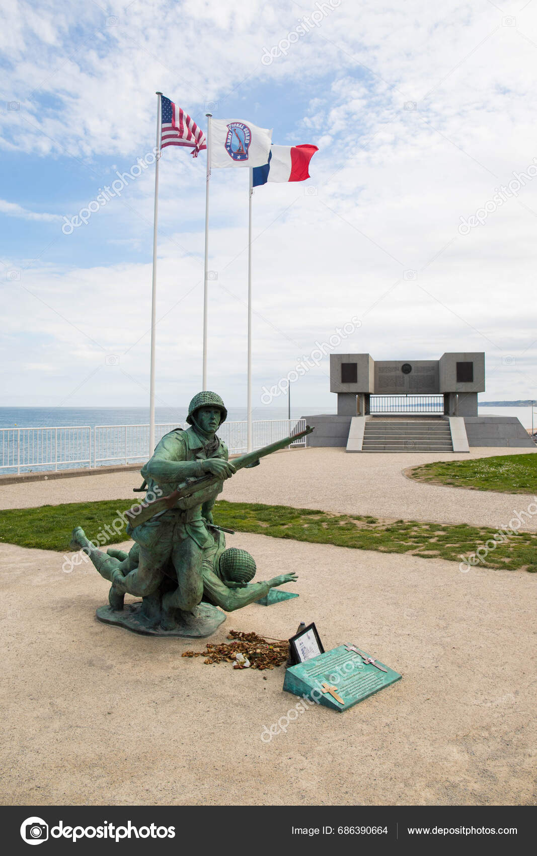 Omaha Beach Memorial Statue Soldier Carrying Rifle Helping His Companion Stock Editorial Photo