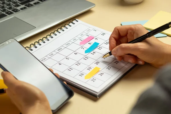 stock image Planning and notes marked in the calendar diary.