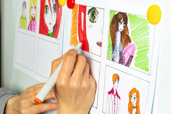 An artist draws a storyboard of an anime comics book. Manga style.