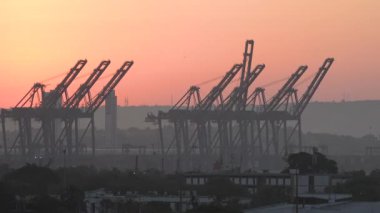 Cargo Sea Port Cranes. Cargo vessel shipping industry. Global import export freight transportation by cargo ship. Export, import of dry cargoes around world. Industrial