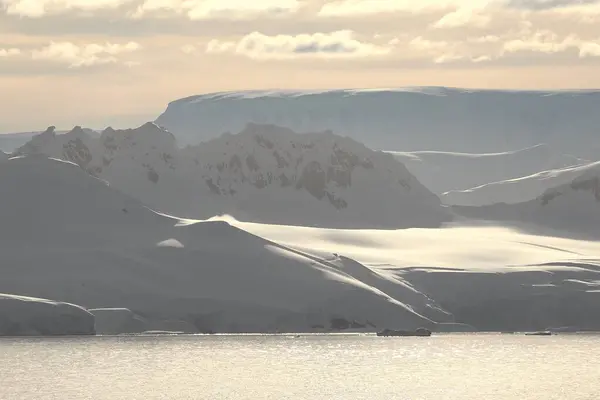 Arctic landscape. Icebergs and global warming. Arctic glacier. Polar Region Antarctica, Climate Change. Ice rapidly melting. Human activities impact on environment, global climate crisis. 4K