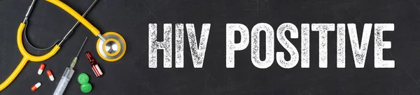 Stethoscope and pharmaceuticals on a blackboard - HIV positive