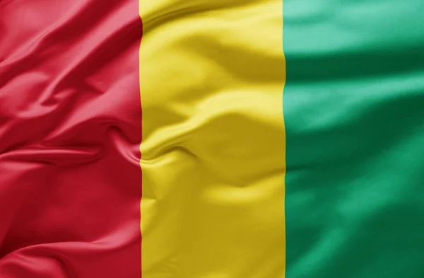 Ondeando Bandera Nacional Guinea — Foto de Stock
