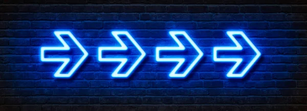 Neon sign on a brick wall - Arrows