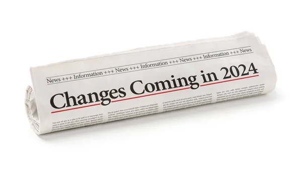 Rolled Εφημερίδα Τον Τίτλο Αλλαγές Που Έρχονται 2024 Royalty Free Φωτογραφίες Αρχείου