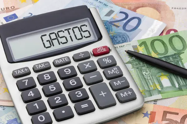 Калькулятор Деньгами Ручкой Расходы Испанском Языке Стоковое Фото