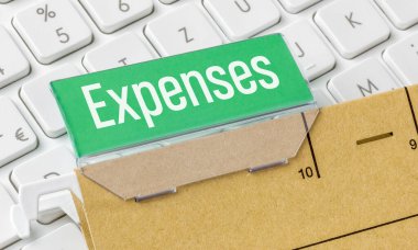 A brown file folder labeled Expenses clipart