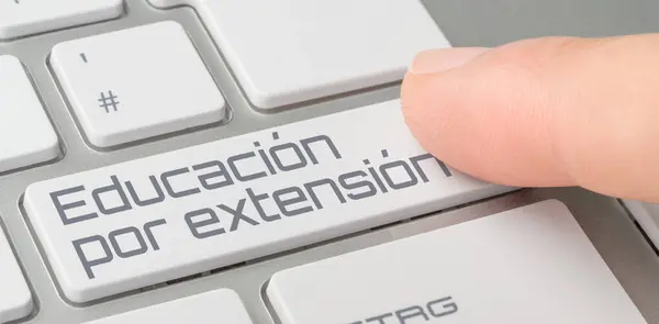 stock image A keyboard with a labeled button - Further education in spanish