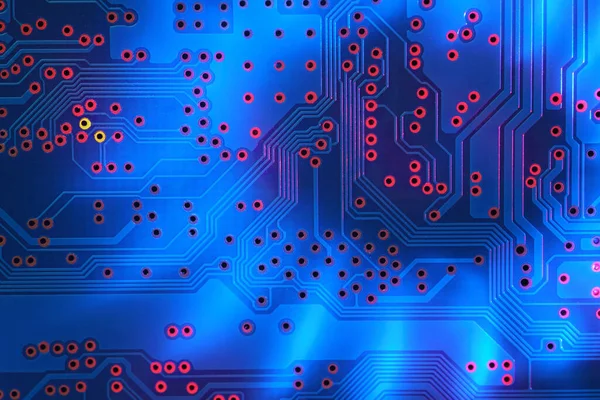 High tech blue electronic circuit board background, close up