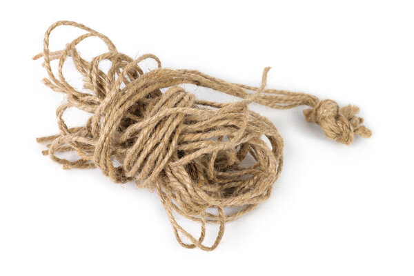 The brown tangled rope on a white background