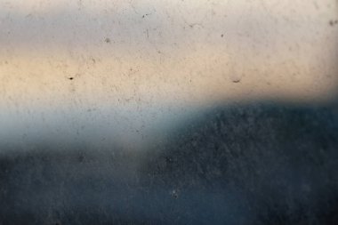 Arkaplanı bulanık kirli cam yüzey