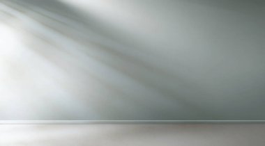 Pencereden gelen güneş ışığı boş oda duvarında ve yerde parlıyor. 