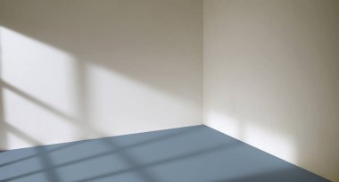 Pencereden gelen güneş ışığı boş oda duvarlarında ve zeminde parlıyor. 