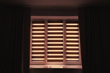 Roll system day and night in the dark room.