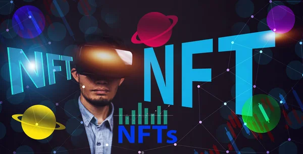Businessman visual screen on metaverse and investment in NFT or NFTs Non Fungible Tokens.NFT token digital crypto art blockchain technology concept