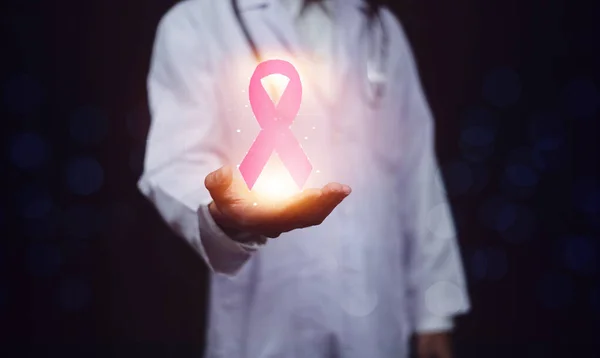 Visual screen Ribbon on hand.Breast cancer awareness, abdominal cancer awareness background, world cancer day