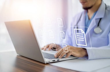 Dosyaları etkin bir şekilde yönetmek için bilgisayar Belge Yönetimi Sistemi (DMS), çevrimiçi belge veritabanı süreci otomasyonu kullanan doktor