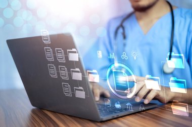 Dosyaları etkin bir şekilde yönetmek için bilgisayar Belge Yönetimi Sistemi (DMS), çevrimiçi belge veritabanı süreci otomasyonu kullanan doktor