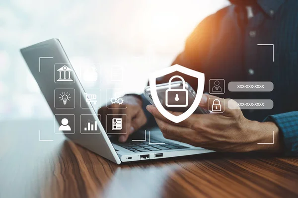 stock image Businessman using password for cybersecurity concept Global network security technology, business people protect personal information. Encryption with a padlock icon on the virtual interface.