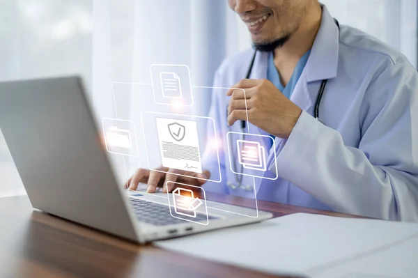 stock image Doctor using computer Document Management System (DMS), online documentation database process automation to efficiently manage files