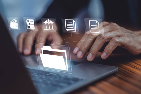 Document Management System (DMS) Entreprur использует компьютер в офисе с поиском в каталоге документов и управлением корпоративной файловой информацией;