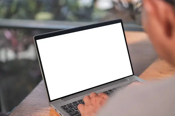 Man using computer and blank screen background for design mockup. mockup image blank screen computer