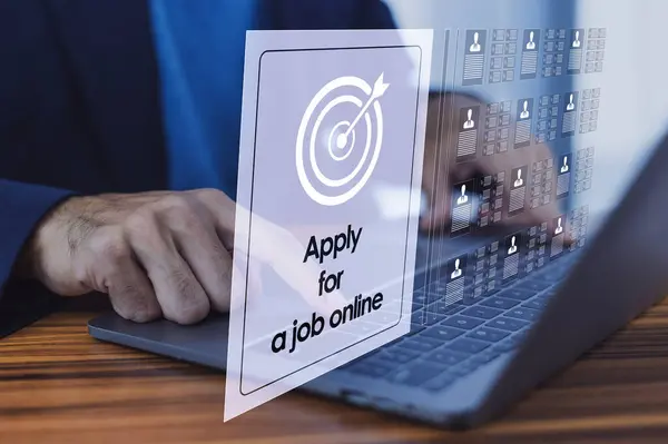 Man uses computer to apply for job online Find jobs that match your needs easily with the online job application system.