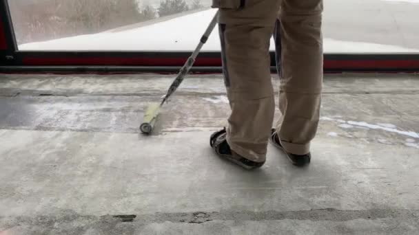 Construction Works Video Footage Priming Floor Surface Further Finishing Work — Stockvideo