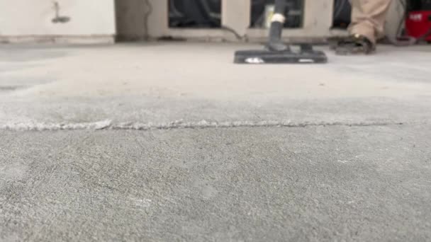 Construction Works Builder Removes Dust Small Debris Surface Cement Sand — Video Stock