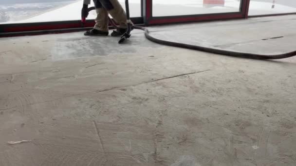 Construction Works Builder Removes Dust Small Debris Surface Cement Sand — Vídeos de Stock