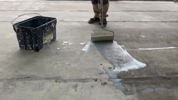 Construction Works Video Footage Priming Floor Surface Further Finishing Work — Wideo stockowe
