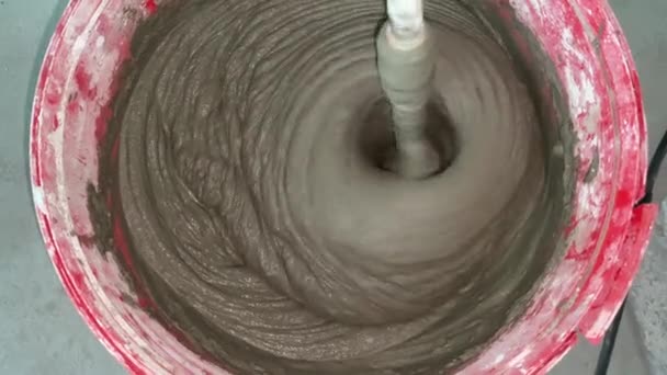 Builder Kneads Dry Mortar Water Using Mixer Video Construction Process — Αρχείο Βίντεο