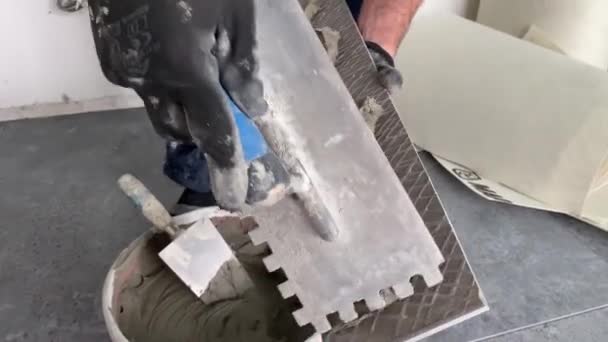 Video Footage Laying Large Wide Format Tile Mounting Mortar Tiler — 비디오