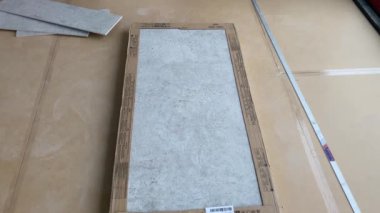 Tiling work. 4k video footage of the finished wall after tiling in a large bathroom