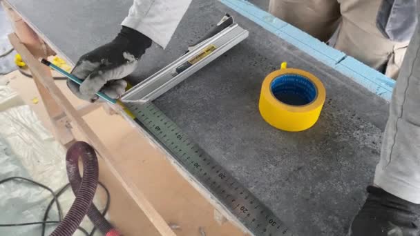 Video Footage Taking Measurements Further Cutting Tiles Using Diamond Cutter — Stock videók